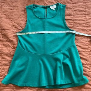 Anthropologie peplum sleeveless top